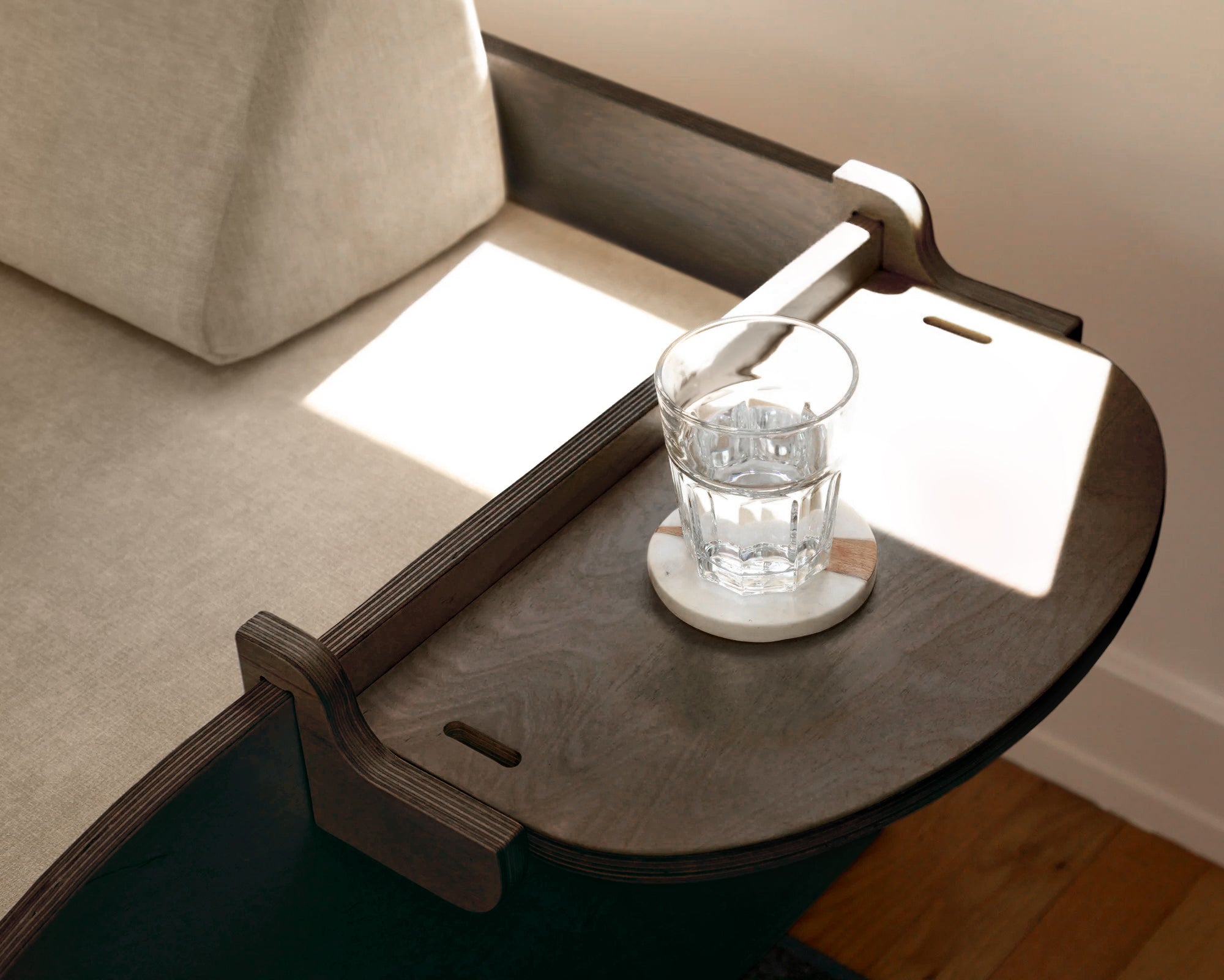 Glass of water on The Side Table on The Frame for the Play Couch.